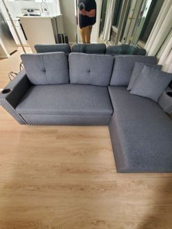 Sectional sofa - convertible bed.