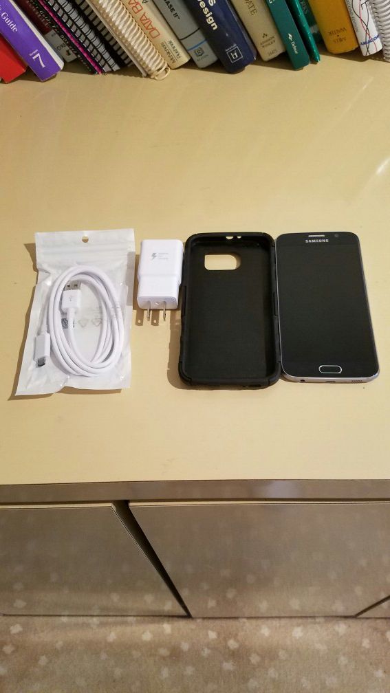 Samsung Galaxy S6 ATT 32GB, it comes with charger, Earphone and Protective Cover