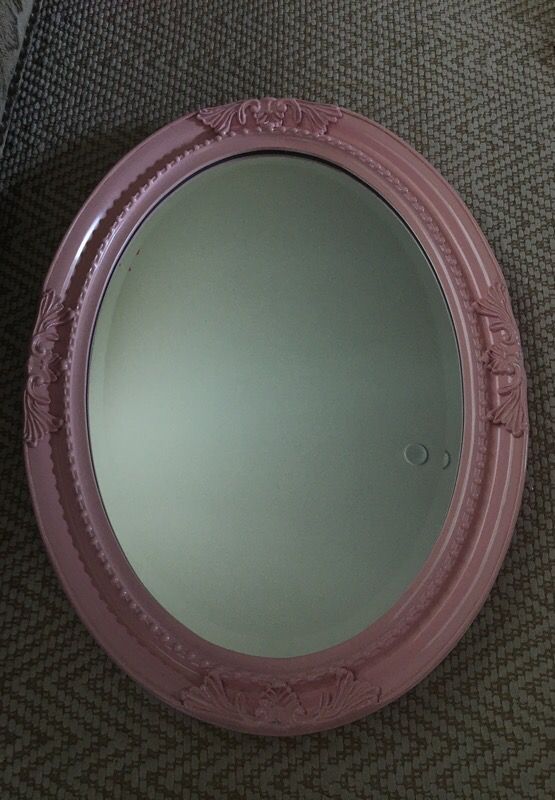 Pink oval mirror