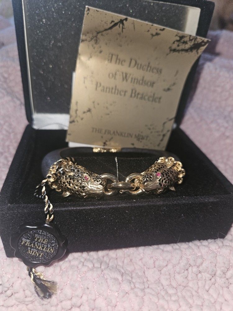 Duchess of Windsor 22kt gold plated Panther with ruby eyes. Bangel Bracelet