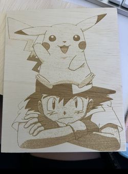 Pokémon ash and pikachu wood carving 