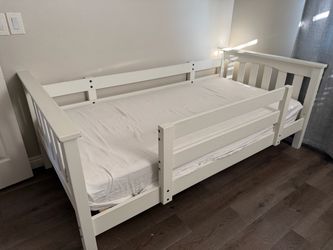 Twin size bed with mattress