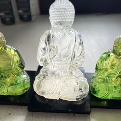 Three Buddha statues