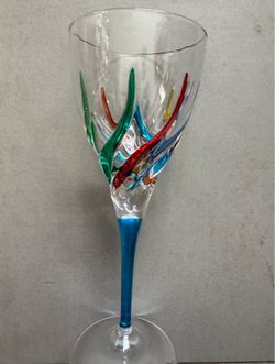 Like New Marked CC Zecchin Murano glass wine glass featuring a rainbow swirl pattern on the bowl and a blue stem