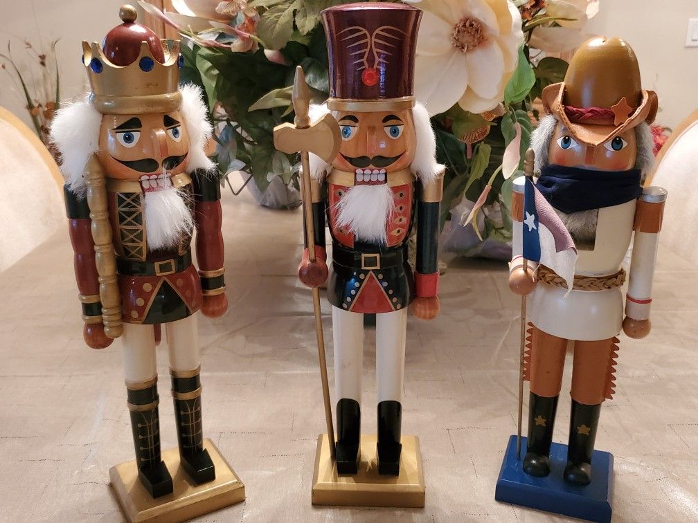 3- Large Nutcracker Soldiers, 1- Cowboy, 1 -King, 1- Soldier, approx. 16 inches high. Quality wood Holiday Decorations