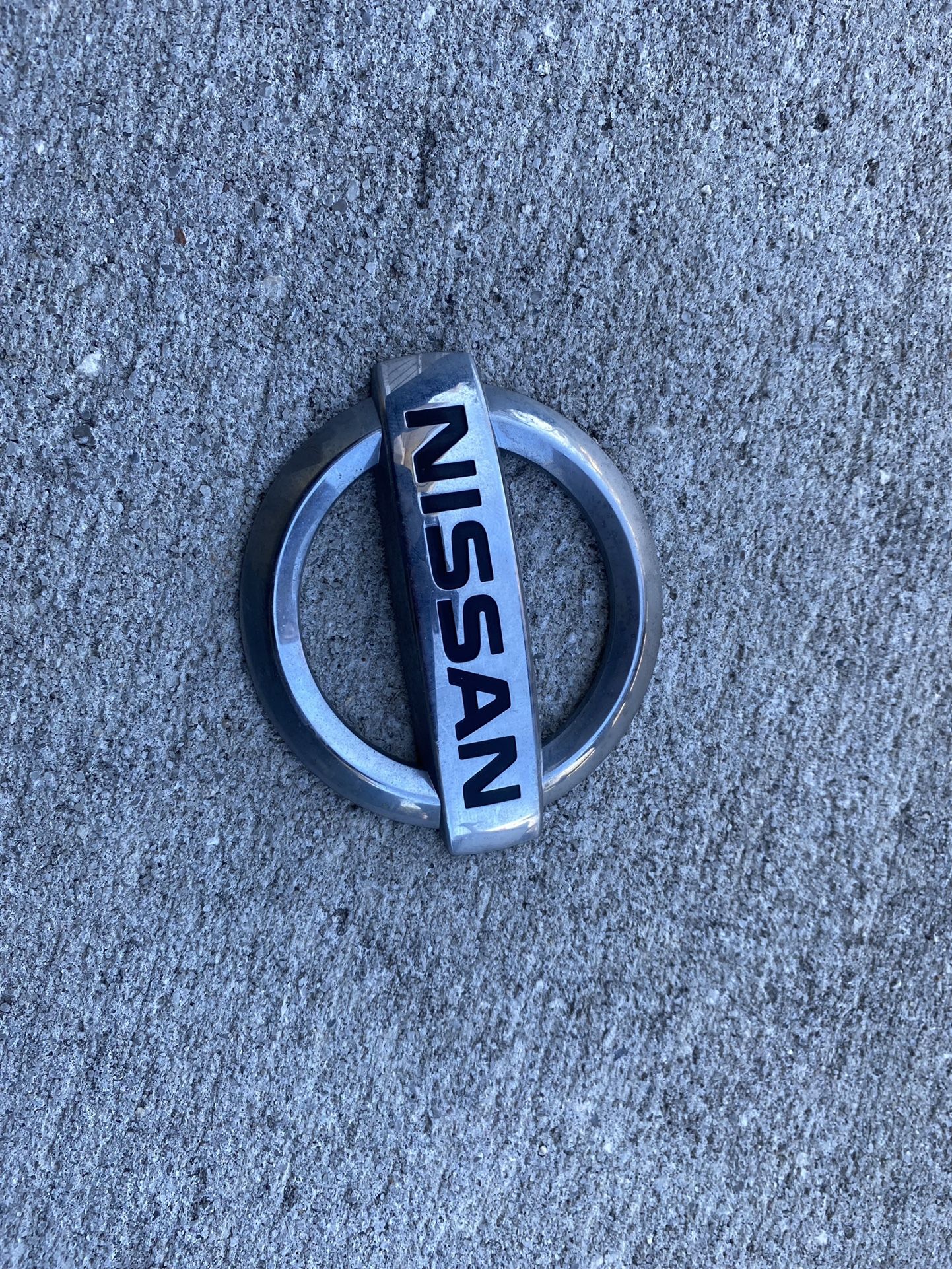 Rear Nissan Sentra Emblem Symbol