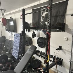 Must Sell OBO- Squat Rack, Curling Bar, Heavy Duty Mats, Olympic Barbel, Rubber Plates, And Adjustable Dumbbell, Uppercut Bag And Double Bag.