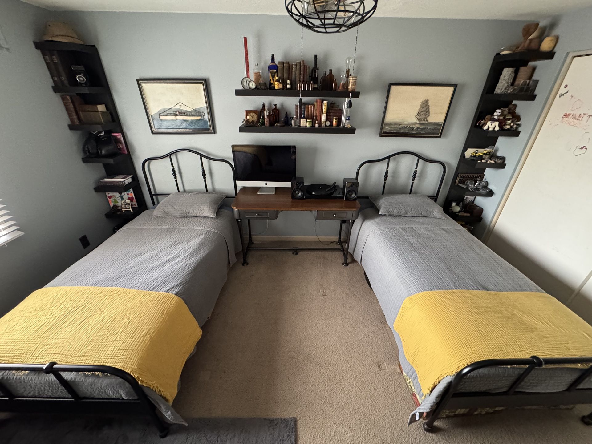 Matching sturdy like new IKEA Sagstua twin beds black w/ brass accents and Luroy mattress support slats