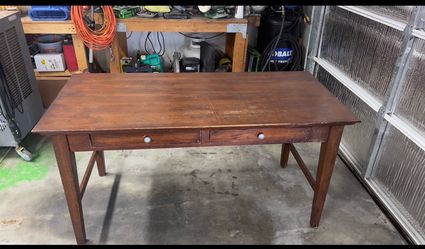 Solid 2 drawer desk.