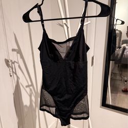 Stylish Calvin Klein black bodysuit. Size small