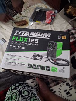 Titanium flux 125 inverter power source wire feeder and gun package