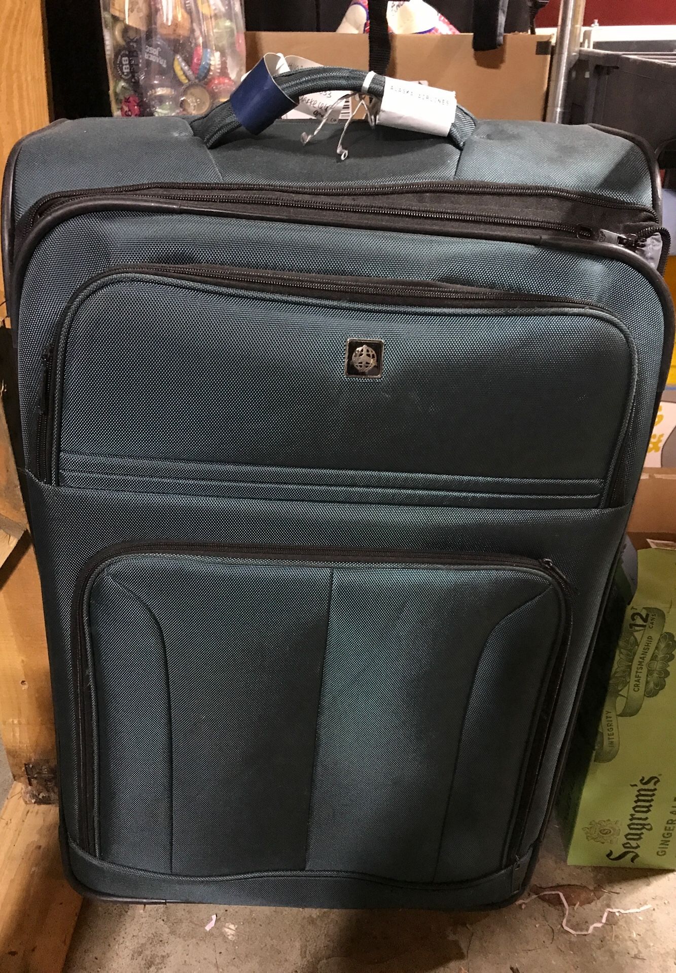 Green travel suitcase 50 liter capacity (large-medium/large