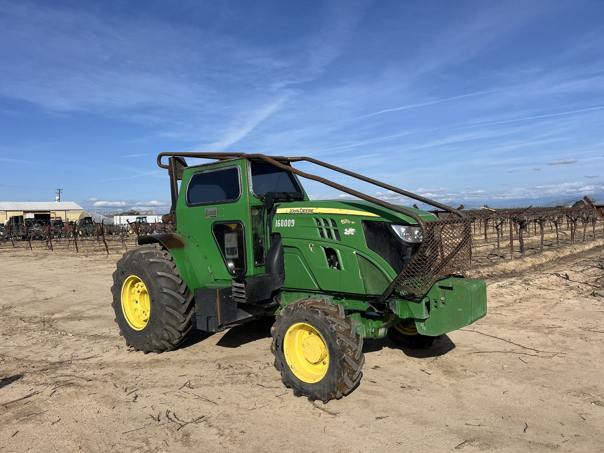 John Deere 6115M