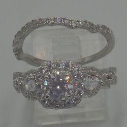 STERLING SILVER RING WITH CUBIC ZIRKONIA 5.6 GRAMS SIZE 8.75 PRE OWNED . 870212-2. 