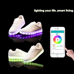 Smart shoes is here. Light up led shoes that works with your iPhone or android. GREAT FOR NEW YEAR PARTY!!!!