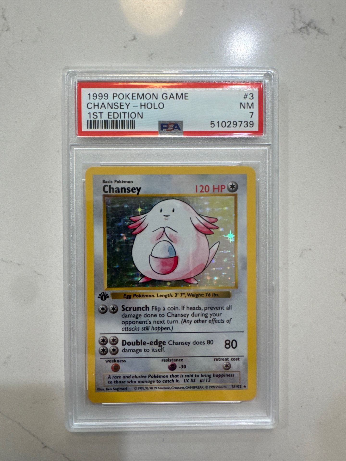 Pokémon Base Set 1st Edition Chansey Holo PSA 7