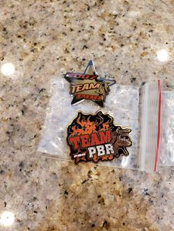Team PBR pins x 2. Brand new ca. 07' & 09'