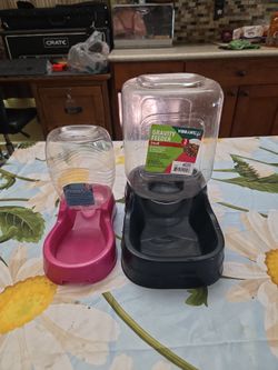 Gravity feeder and water receptacles