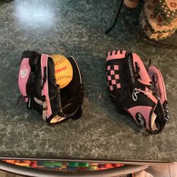 2 Girls baseball/tball gloves and one ball. one is Rawlings 9 1/2” glove and the other is Hello Kitty 8”  Both in great condition comes with one ball 