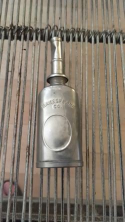 Vintage fishing real oil can.