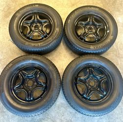 Toyota steel wheels and like New Tires (4) With 20 Chrome Lug Nuts