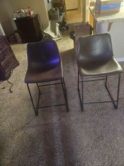 Two used barstools