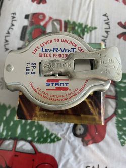 Lift Lever To U lo k Cap