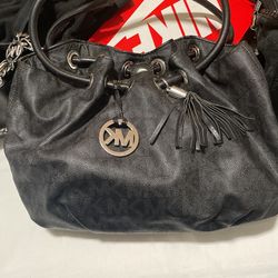 Kk purses and a coach purse
