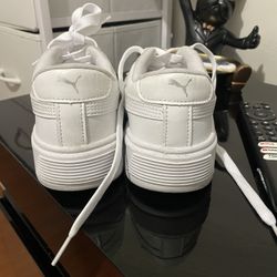 White Puma tennis shoes, size 6.5, lightly used