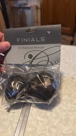 Oil rubbed bronze curtain rod finals