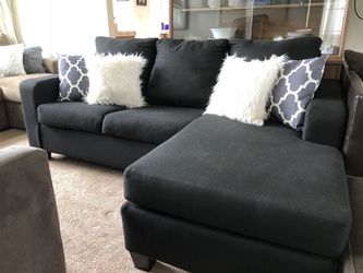 Charcoal black sectional w deep seats and Movable Chaise