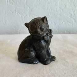 Antique cast iron cat figurine