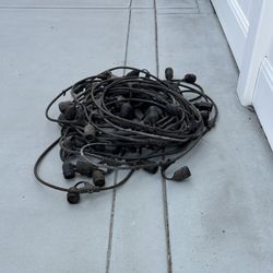 Outdoor (4) Sets Patio Lights 24’ In Length & Holds (12) Bulbs