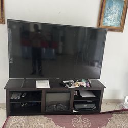 75 inch sumsung t v with fire stand 500