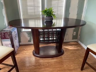 Dark Wood Oval Pedestal Dining Table