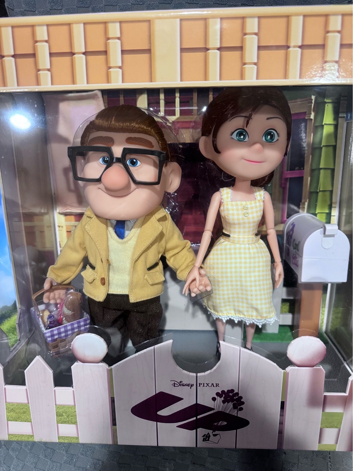NIB CARL AND ELLIE DOLLS