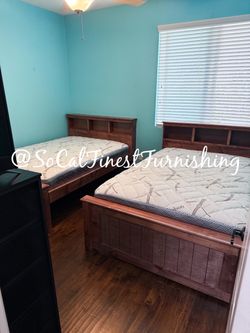 2 brown full size bed with  mattress