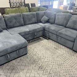 New Corduroy Sectional W Pullout Bed / Chaise Storage.  Grey.  96x127x61x36H.  Free Delivery!