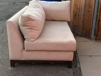 Custom cream colored sectional sofa w wood base