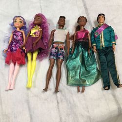 Barbie dolls see description