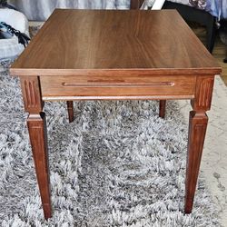 Brown Side End Table With New Staining And Wooden Legs.