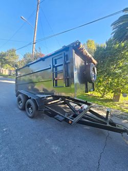 NEW DUMP TRAILERS 12x8x4 ROLLING TARP AND SPARE TIRE 2026 YEAR ELECTRIC BRAKES LIGHTS REMOTE CONTROL TITLE IN HAND READY FOR WORK,se habla ESPAÑOL