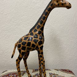 Vintage Giraffe leather hand crafted animal statue.  Measures 19” tall from tip of ear to bottom hooves. Preowned. Would make a great addition to a sa