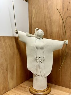 WATARU SUGIYAMA - “SUN GODDESS”, 24” ( TO THE TIP OF THE ARROW ) X 19” X 5”, CLAY, GLAZE