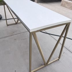 White table With Gold Accent Legs