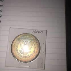 1899 O Silver Morgan Dollar “DEEP TONING”