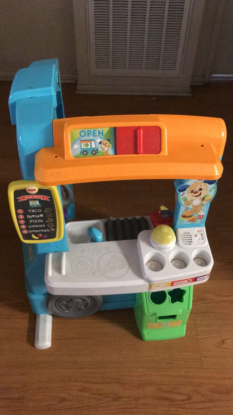 Kids interactive taco truck comes with toys