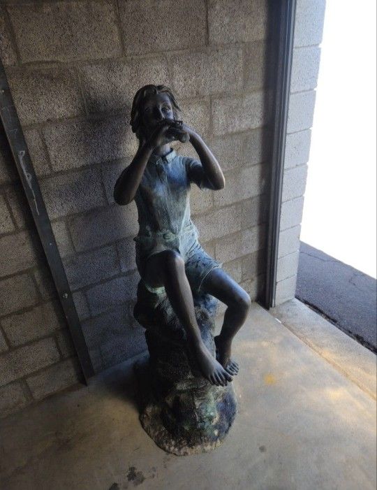 Girl Bronze Statue Located In Mesa 