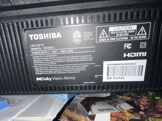 Almost new 4K TV in excellent condition+ TV Table