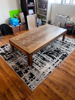 Large sturdy coffee table.